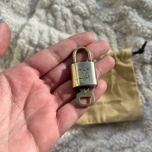 Louis Vuitton Gold Padlock with Key # 328 with dust bag